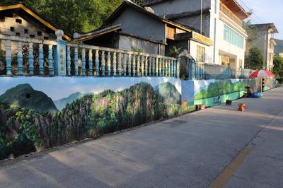 手绘墙画扮靓景区路